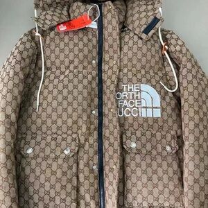 The North Face Orange and Brown Patterned Jacket